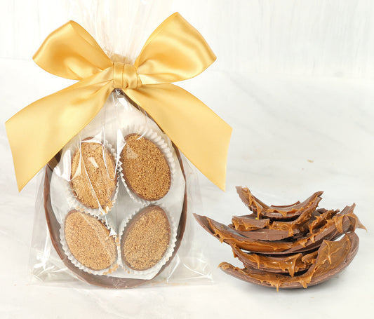 Biscotti Stuffed Easter Egg. Speculoos Cream Shell with Mini Cream Eggs